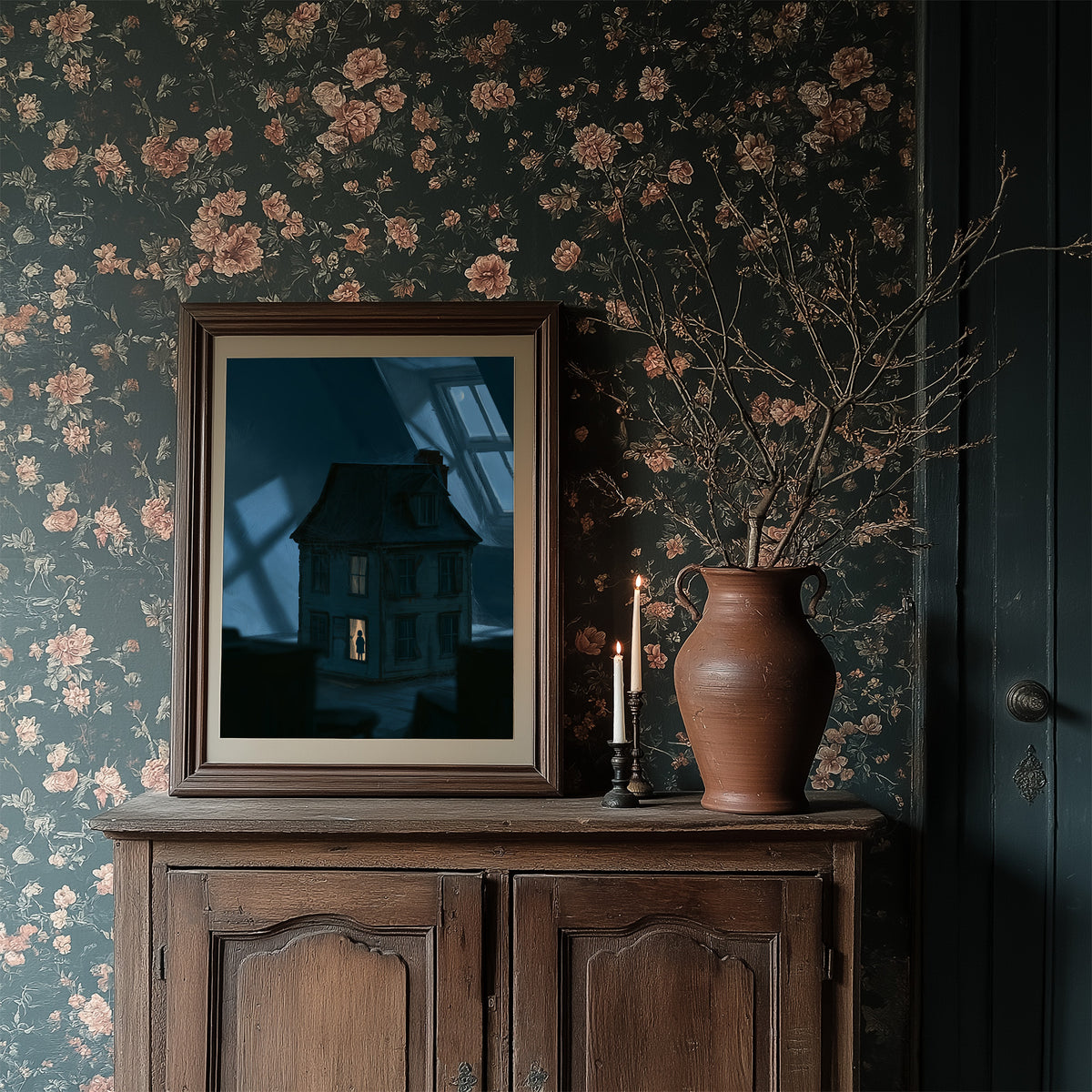 Moonlit Windows of the Old Manor, a Victorian house with lit windows under a blue moonlit night, painted in midnight blue, slate and a single warm window glow, in a dark frame on a wooden dresser against floral wallpaper