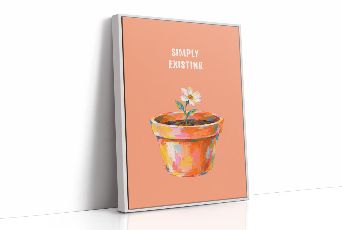 One Small Bloom in Clay, a single white flower rising from a painted clay pot in coral, gold and pink brushstrokes, on a peach ground with two lines of bold pale lettering above, in a loose painterly style, as a framed canvas in a white frame