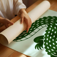 Perfectly Harmless, Mind the Teeth, a deep green crocodile curling down a pale mint ground, with a bold hand lettered line above reading I'M PERFECTLY HARMLESS and one below reading JUST MIND THE TEETH, as a matte poster, unframed