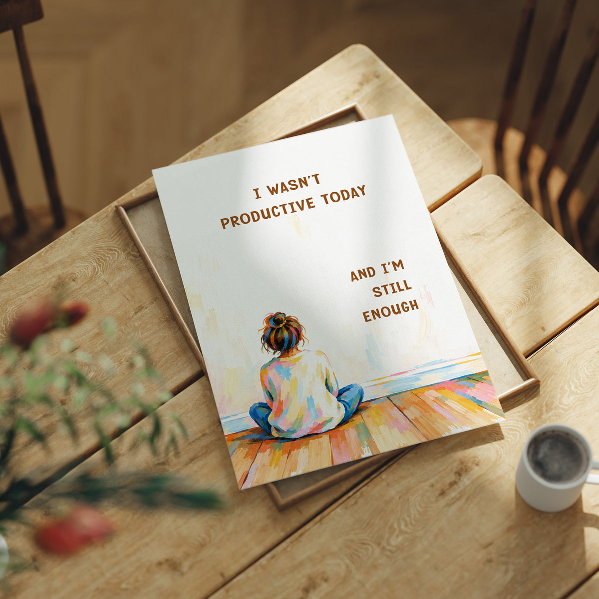 Quiet Hours on Painted Floors, a child seen from behind sitting cross legged on painted floorboards in coral, blue and cream, with two lines of bold brown lettering on a pale cream ground, in a soft illustrated style, lying flat on a light wood table beside a coffee cup and red berries