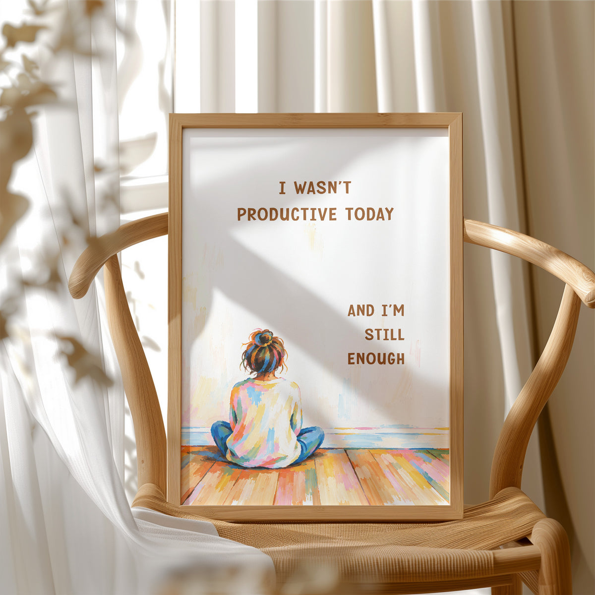Quiet Hours on Painted Floors, a child seen from behind sitting cross legged on painted floorboards in coral, blue and cream, with two lines of bold brown lettering on a pale cream ground, in a soft illustrated style, in a wood frame beside a wicker chair by a sunny window