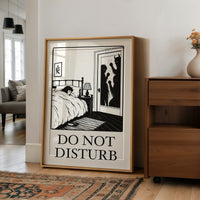 Quiet Hours Until Someone Knocks, a black ink woodcut style scene of a woman asleep in bed beside a lamp and a small framed plant picture while horned shadows lurk at the open door, and the words DO NOT DISTURB in black serif capitals on cream paper, in a dark frame on a black shelf beside brass candles and dried leaves