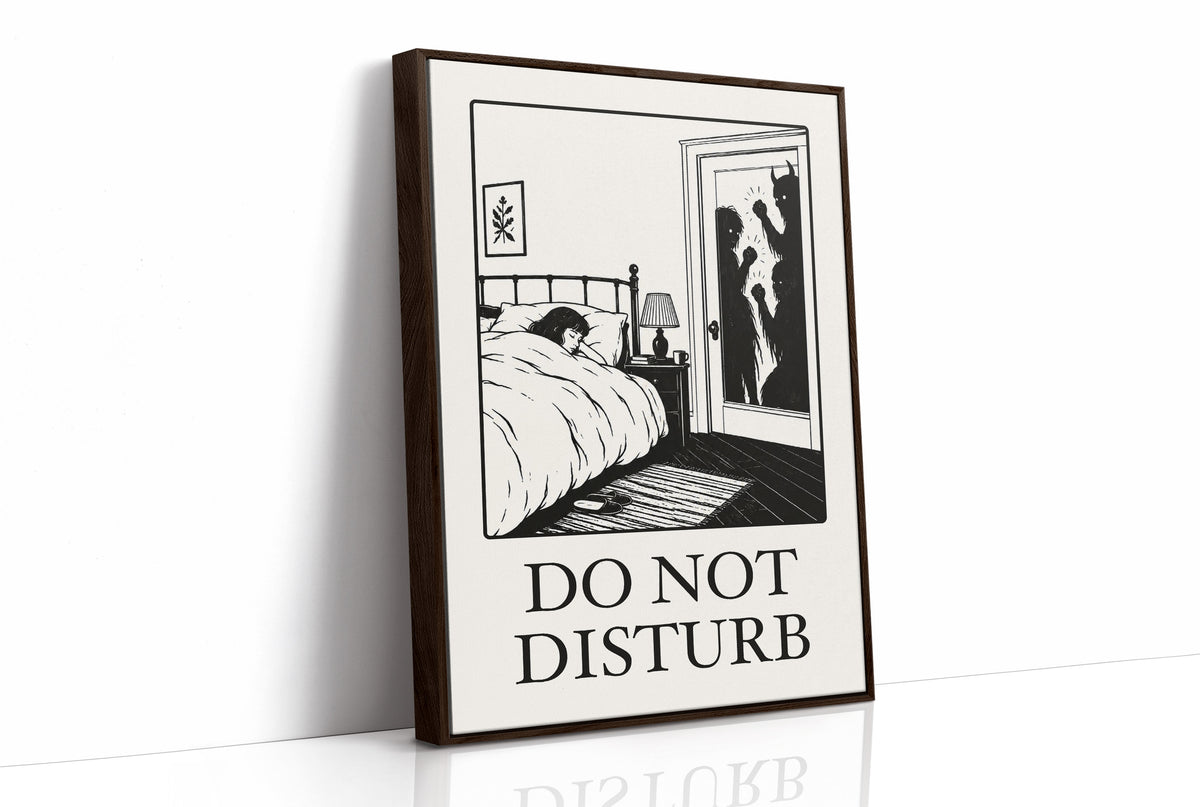 Quiet Hours Until Someone Knocks, a black ink woodcut style scene of a woman asleep in bed beside a lamp and a small framed plant picture while horned shadows lurk at the open door, and the words DO NOT DISTURB in black serif capitals on cream paper, as a framed canvas in a brown frame
