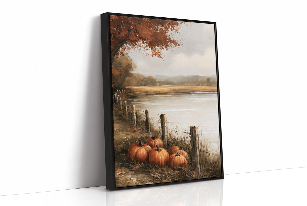 Quiet Water at the Fence Line, weathered fence posts and orange pumpkins on a grassy bank beside a misty lake, with a russet tree leaning over the water, painted in soft ochre, rust and pale gray, as a framed canvas in a black frame