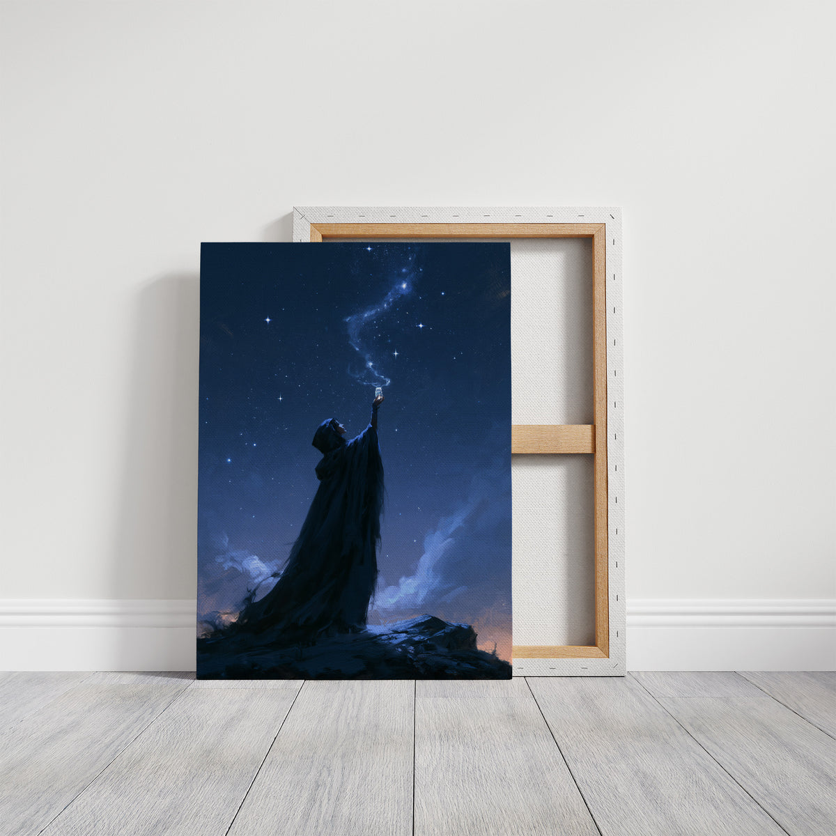 Reaching for the Starfall, a cloaked figure raising one arm toward a trail of light across a deep blue night sky, painted in midnight blue, indigo and pale silver, on a gallery canvas with wrapped edges leaning against a white wall