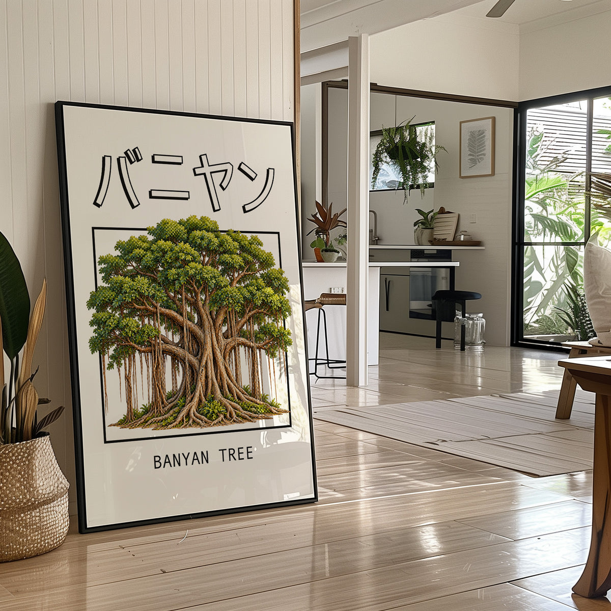 Roots That Remember the Ground, a banyan tree with a wide green canopy and many aerial roots hanging to the ground, drawn in a framed Japanese travel poster style with katakana above and BANYAN TREE below, in a black frame leaning on a bright hallway floor beside a potted plant