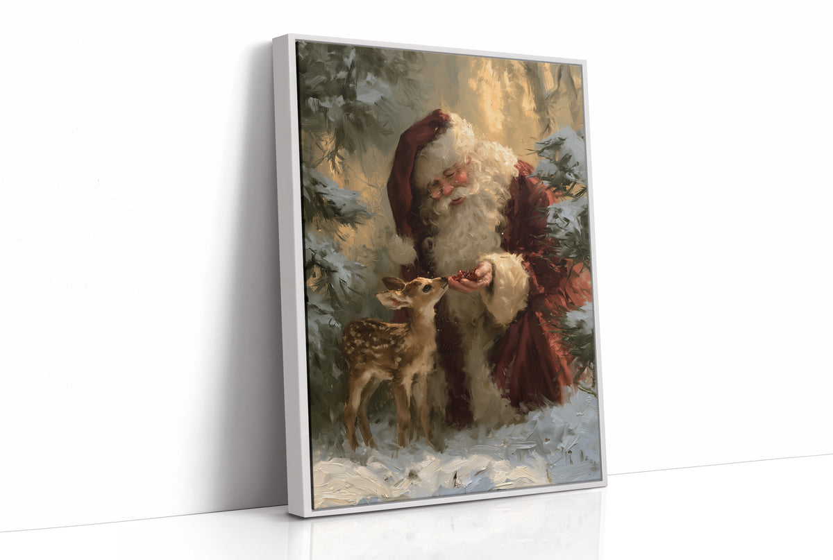 Saint Nick Keeps a Fawn Close, a painterly vintage Santa Claus in a red hat with a fawn tucked against his coat, set among pine boughs in snow, painted in deep green, rust and gold, as a framed canvas in a white frame