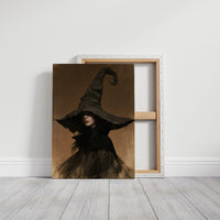 She Keeps Her Own Counsel, a dark witch in a tall pointed hat and a cloak, in a sepia portrait with a gilt frame, on a gallery canvas with wrapped edges leaning against a white wall