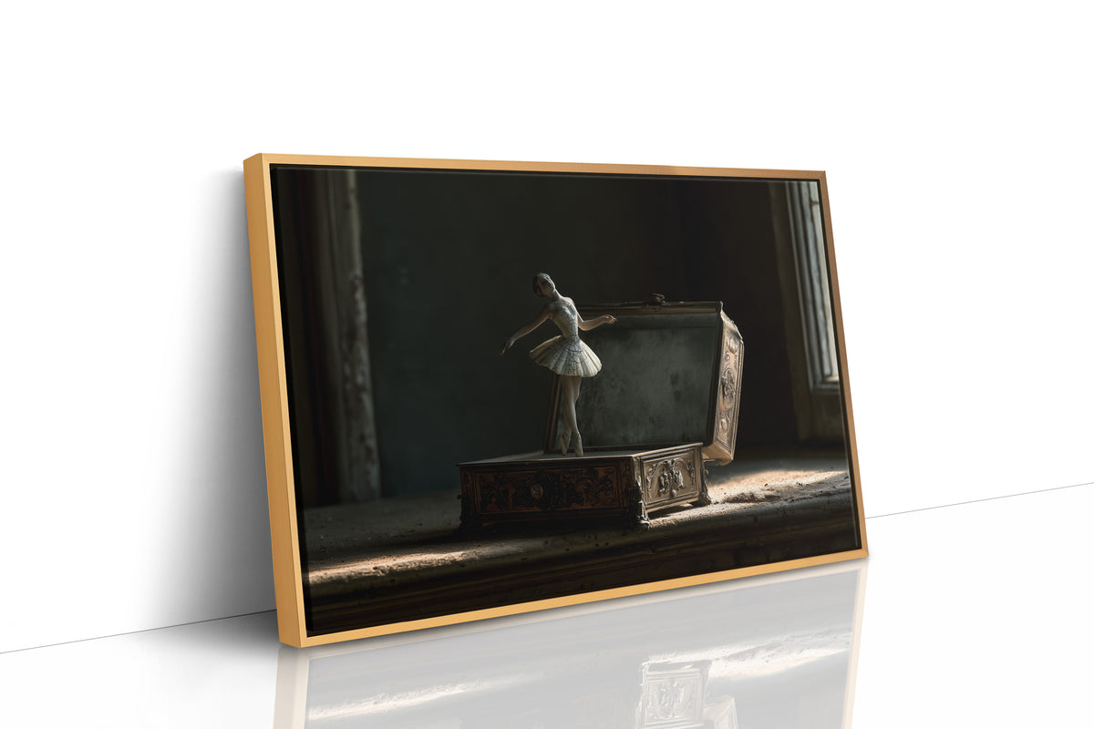 She Waits Before the First Note, a porcelain ballerina figurine poised on a carved music box in a dim room, painted in charcoal, slate and pale ivory, as a framed canvas in a natural wood frame