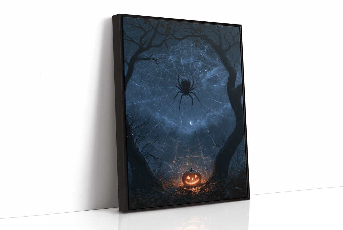 Silver Threads Over the Hollow, spider web glowing with silver threads over a blue night forest with a pumpkin lantern painting, as a framed canvas in a black frame