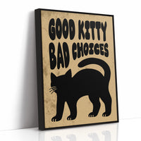 Sleek Silhouette, Questionable Taste, a solid black cat silhouette with a long tail curled up the side, standing on tan paper with the words GOOD KITTY BAD CHOICES in bold black lettering, as a framed canvas in a black frame