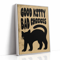 Sleek Silhouette, Questionable Taste, a solid black cat silhouette with a long tail curled up the side, standing on tan paper with the words GOOD KITTY BAD CHOICES in bold black lettering, as a framed canvas in a white frame