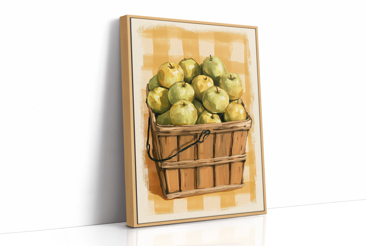 Something Sweet Waits in the Basket, a basket heaped with pale green pears on a soft yellow gingham ground, painted in lemon, sage and warm tan, as a framed canvas in a natural wood frame
