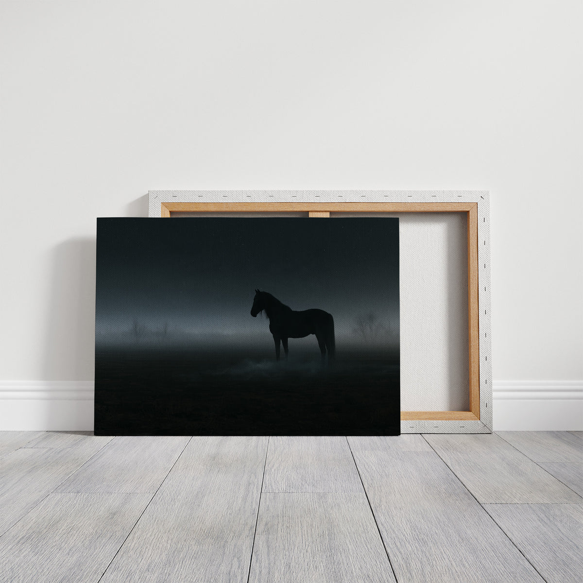 Still Ground Before Morning, a dark horse standing alone in a field where fog has swallowed the horizon, a faint silver light spilling across the mist, on a gallery canvas with wrapped edges leaning against a white wall