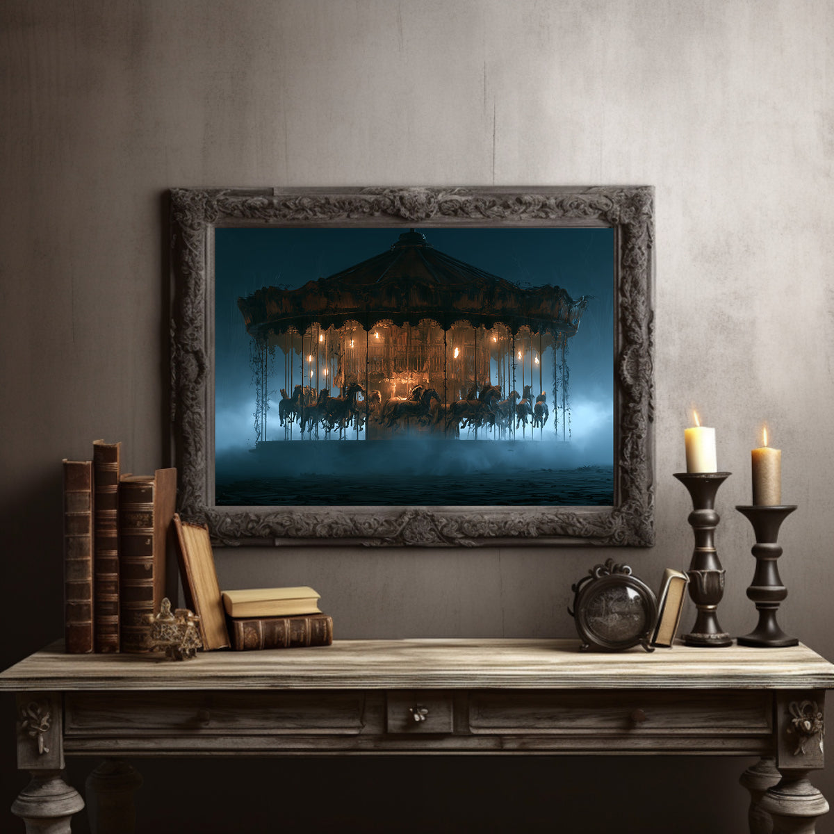 Still Turning in the Fog, a carousel horse ride at night wrapped in fog, its lanterns glowing gold against a deep teal sky over a dim ground, painted in teal, gold and deep slate, in a dark carved frame on a gray wall above a console table with candlesticks and old books