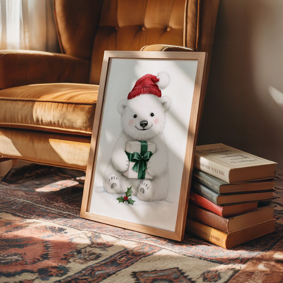 The Bear Cub Keeps a Secret, a small polar bear cub in a red knit hat hugging a green wrapped gift with a sprig of holly at its feet, on a soft cream ground, in a wood frame on a rug beside a leather armchair and a stack of books