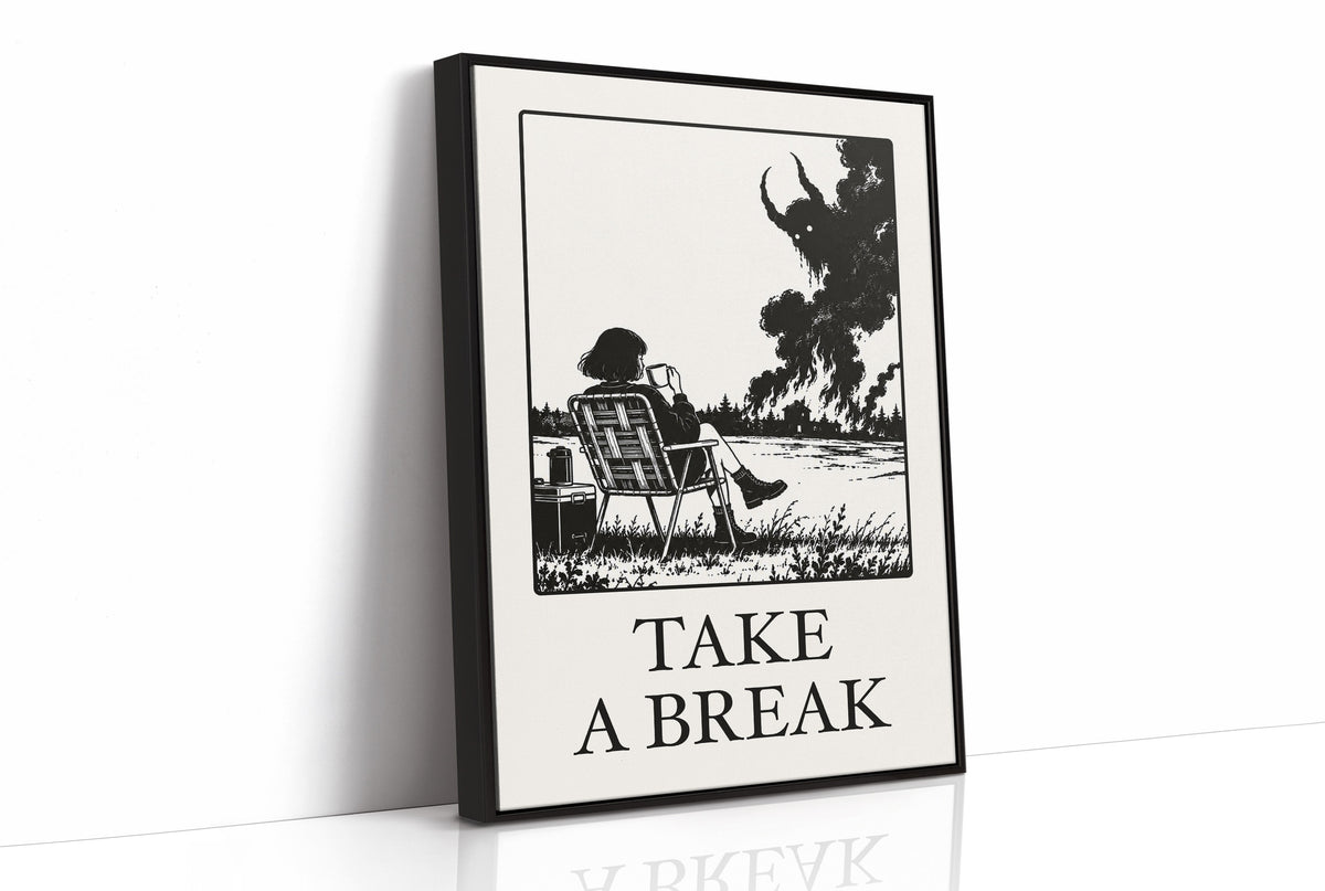 The Break Nobody Schedules, a figure in a deck chair under a broad tree in a black and cream line scene, with TAKE A BREAK in large serif capitals beneath, as a framed canvas in a black frame