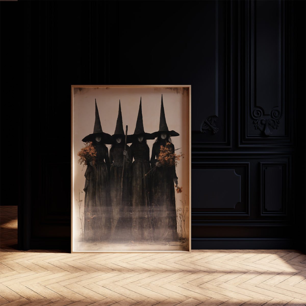 The Coven Keeps Its Silence, five witches in tall pointed hats standing shoulder to shoulder, painted in black, charcoal and dusty cream, on a black paneled wall above a sunlit herringbone floor