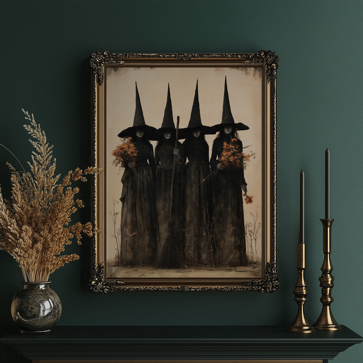 The Coven Keeps Its Silence, five witches in tall pointed hats standing shoulder to shoulder, painted in black, charcoal and dusty cream, in an ornate gold frame on a deep green wall beside brass candlesticks