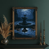 The Fountain Holds Its Breath, moonlit garden fountain painting in deep blue, in an ornate gold frame on a deep green wall beside brass candlesticks