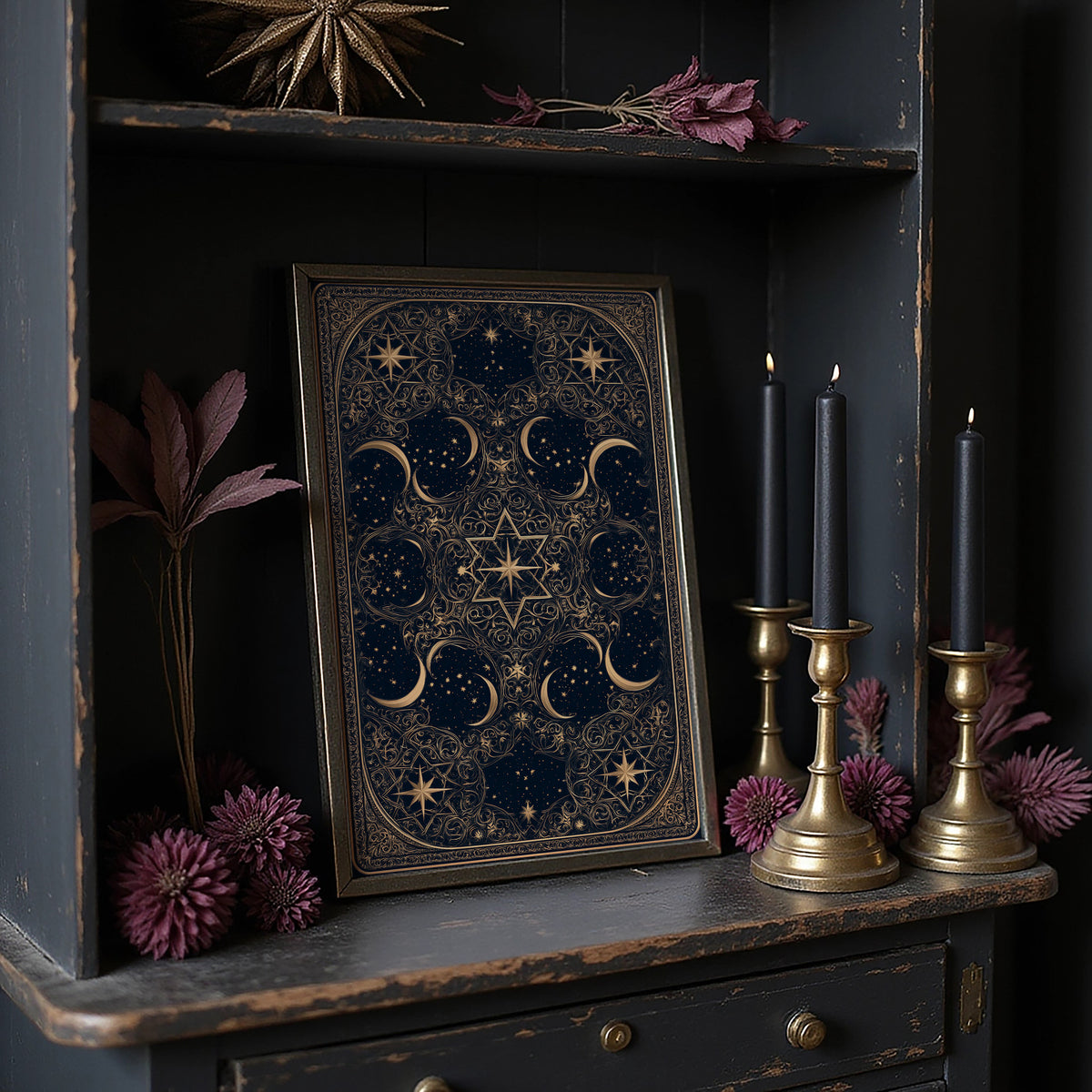 The Gilded Wheel of Midnight, a gold ornamental mandala of moon phases and stars on a deep navy field, painted in navy and antique gold, on a dark wooden cabinet shelf with candles and dried flowers