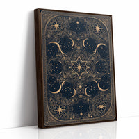 The Gilded Wheel of Midnight, a gold ornamental mandala of moon phases and stars on a deep navy field, painted in navy and antique gold, as a framed canvas in a brown frame