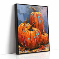 The Harvest Keeps Its Blue Hour, three painted pumpkins in orange and teal on a dusky blue ground with fallen leaves at their feet, in a loose, bold, painterly style, as a framed canvas in a black frame