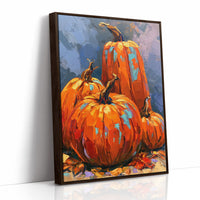 The Harvest Keeps Its Blue Hour, three painted pumpkins in orange and teal on a dusky blue ground with fallen leaves at their feet, in a loose, bold, painterly style, as a framed canvas in a brown frame