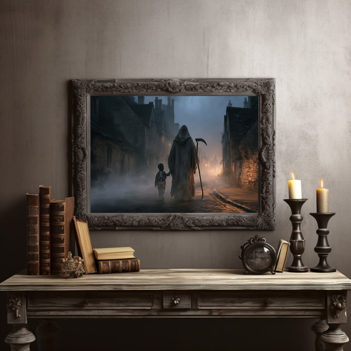 The Lantern Walk Home, hooded figure with a scythe walking a foggy cobbled street beside a child holding a lantern painting, in a dark carved frame on a gray wall above a console table with candlesticks and old books