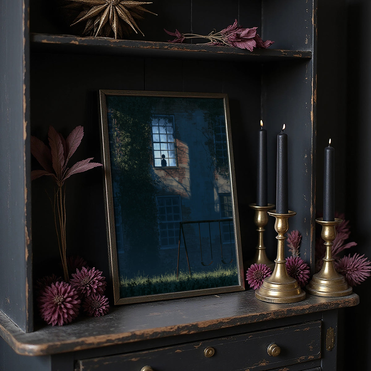 The Last Light Left Upstairs, a dark blue house at night with one lit upstairs window, a fence and tall grass in the foreground, midnight blue palette, on a dark wooden cabinet shelf with candles and dried flowers