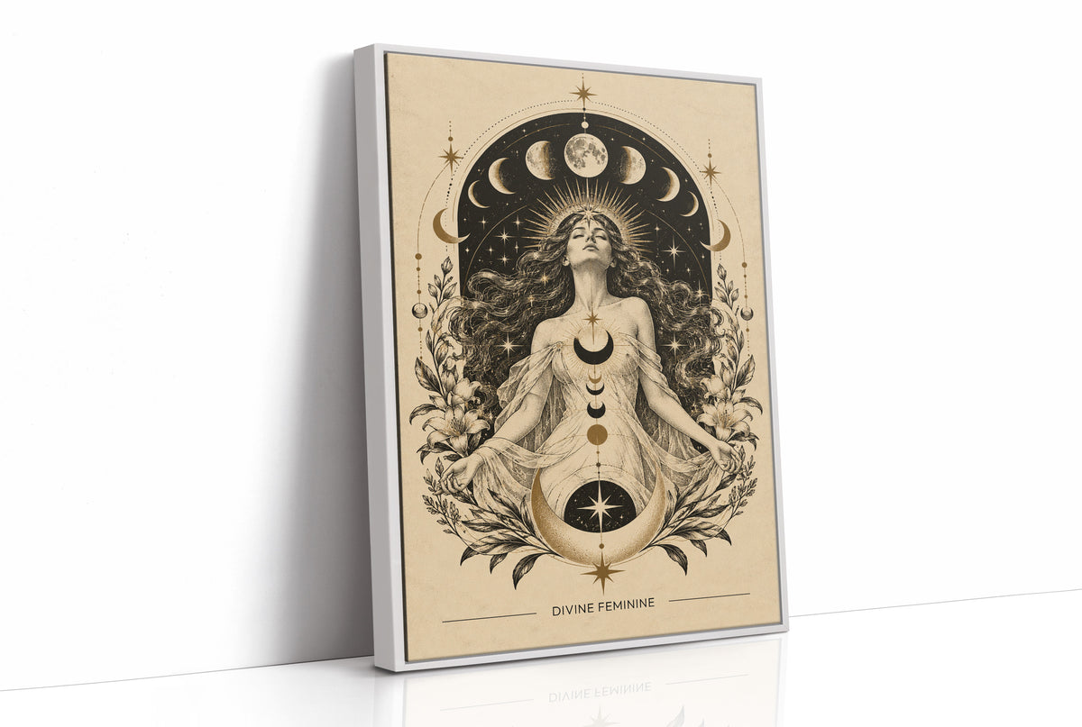 The Moon Woven Into Her Hair, a seated woman in quiet meditation crowned with a ring of crescent moons and surrounded by fern fronds, drawn in cream, charcoal and sepia with a deep brown border and small text at the base, as a framed canvas in a white frame