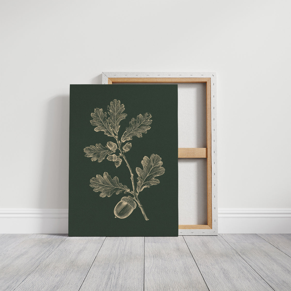 The Oak Keeps Its Harvest Close, a sprig of lobed oak leaves and three acorns drawn in pale cream lines on a deep forest green ground, in a botanical study style, on a gallery canvas with wrapped edges leaning against a white wall