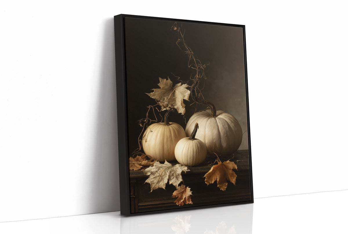 The Pale Ones Keep Their Vigil, three pale pumpkins and a few gold oak leaves in a still life on a deep black ground, with dried vine stems curling above, painted in cream, ochre and charcoal, as a framed canvas in a black frame