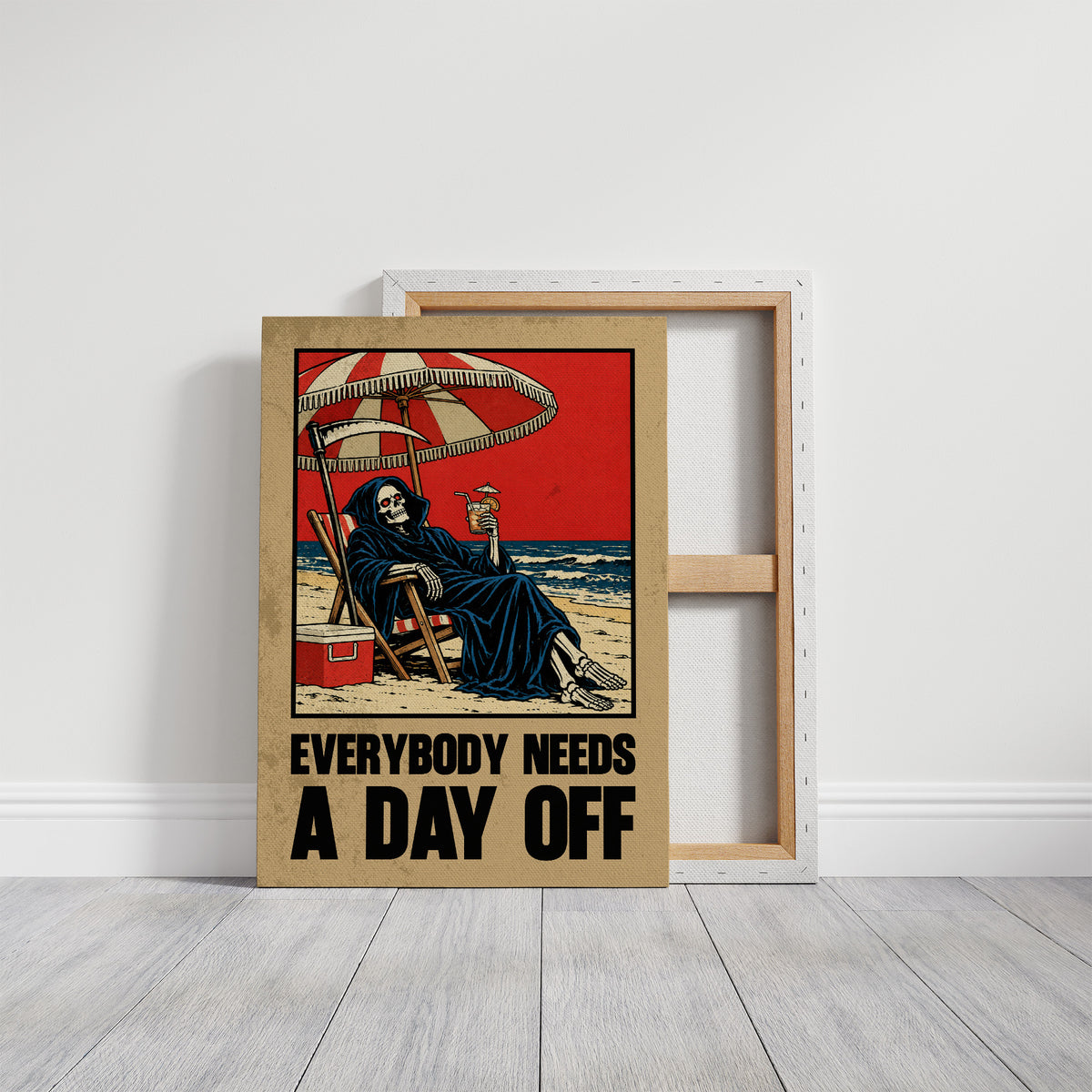 The Reaper Takes a Day Off, a hooded grim reaper in a deck chair under a striped umbrella on a red and cream beach poster, with the lettering EVERYBODY NEEDS A DAY OFF in bold black and tan below, in a retro print style, on a gallery canvas with wrapped edges leaning against a white wall