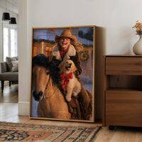 The Rider and the Golden Companion, a rider in a wide brimmed hat on a brown horse with a golden dog at the saddle, painted in saddle brown, dusky blue and warm gold, in a wood frame on a wall beside a walnut cabinet and an open doorway