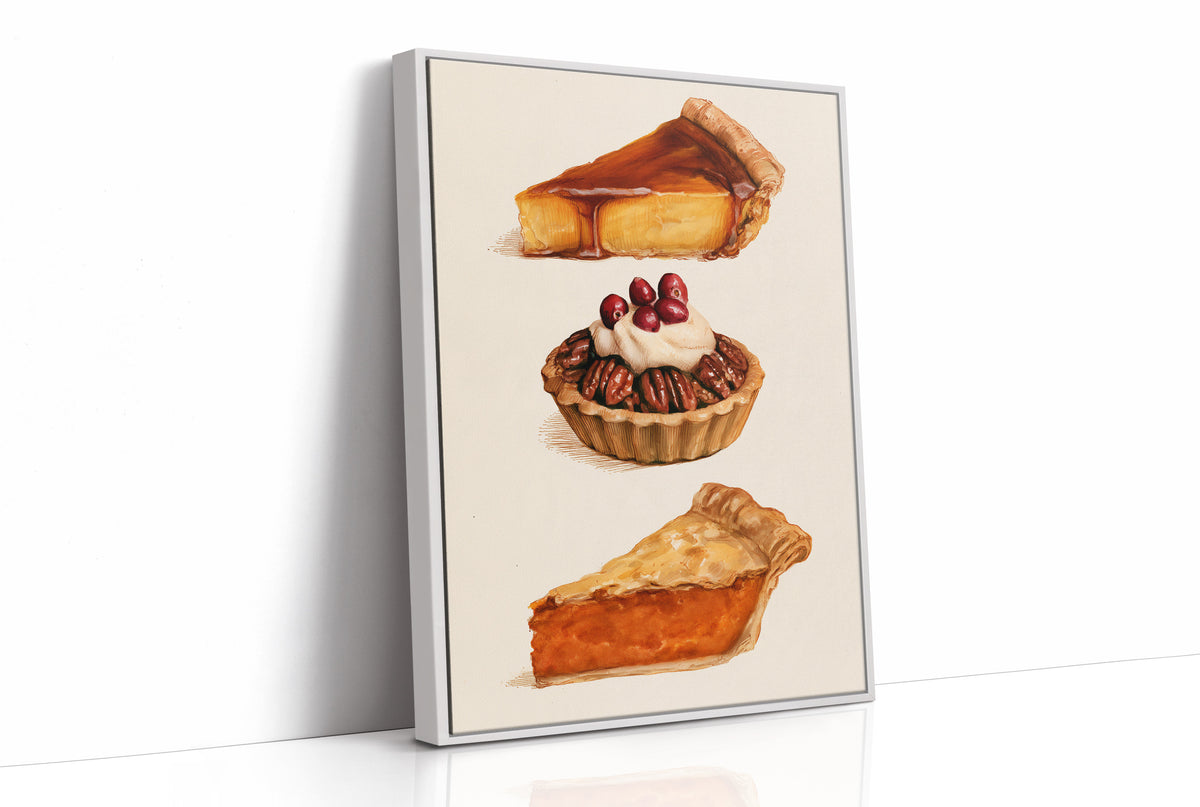 Three Slices Keep the Table Company, three pies stacked down the page, a golden custard slice, a pecan tart with cherries and a pumpkin wedge, on a cream ground, as a framed canvas in a white frame
