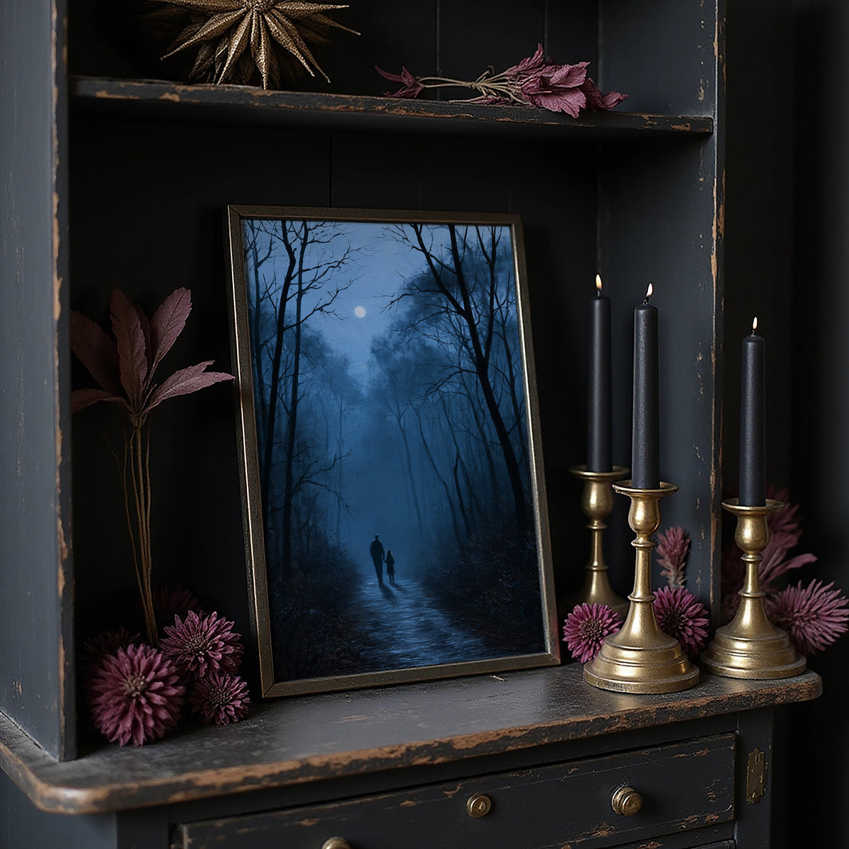 Two Shadows Take the Long Road, two dark figures walking a misty forest path between tall bare trees under a pale moon, painted in midnight blue, fog gray and soft silver, on a dark wooden cabinet shelf with candles and dried flowers