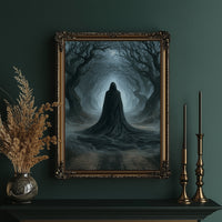 Veiled Beneath the Bending Trees, a hooded robed figure standing at the end of a tunnel of bare trees in pale blue fog, in an ornate gold frame on a deep green wall beside brass candlesticks