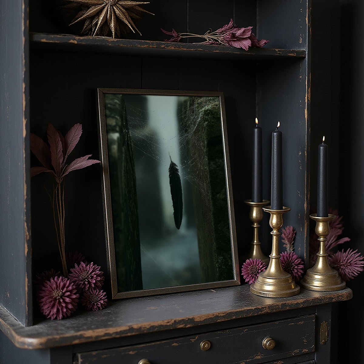Where the Mist Leaves a Door Open, a narrow path between tall dark trees in pale fog, a single dark cypress at the center, deep green and charcoal moody landscape, on a dark wooden cabinet shelf with candles and dried flowers