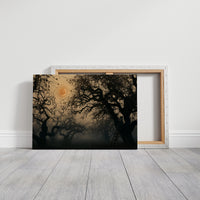 Where the Old Oak Keeps Watch, a bare twisted tree silhouetted against an amber full moon above a misty dark forest, on a gallery canvas with wrapped edges leaning against a white wall