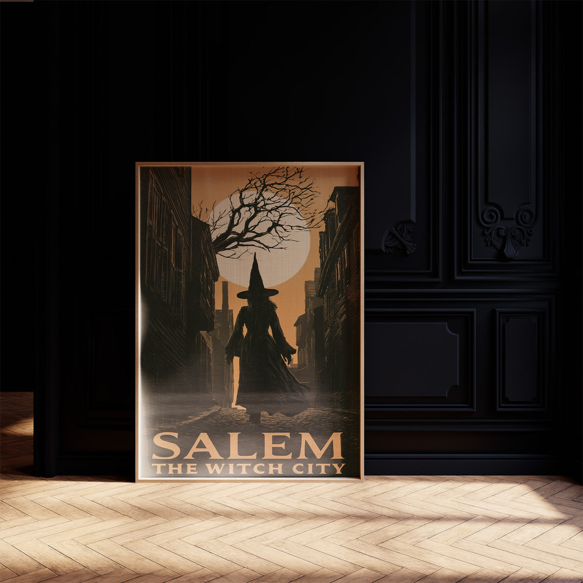 Witch City at Moonrise, a cloaked silhouette beneath a bare tree and a full moon on a vintage style travel poster, painted in amber, olive and black, on a black paneled wall with sunlit herringbone floor