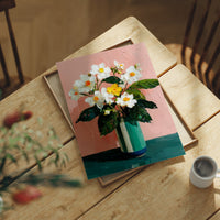 White Flowers Against a Pink Wall
