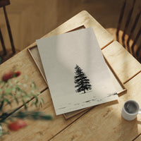 Solitary Pine in Snowfall