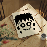 Bolt Of Approval, print laid on a wooden table beside a white mug and flowers