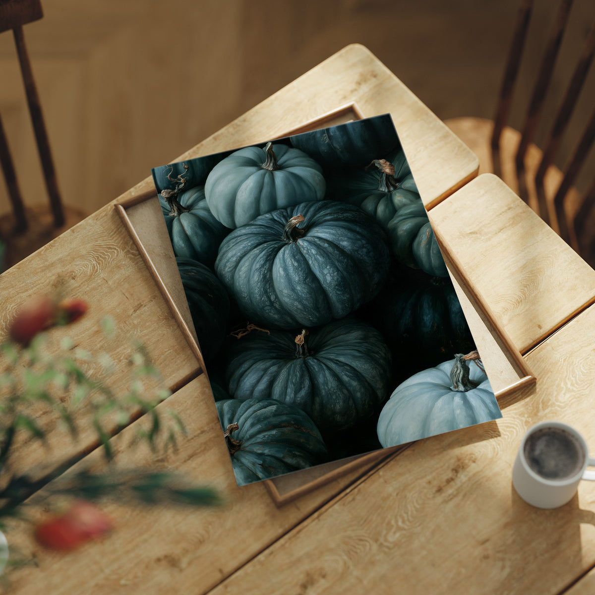 Teal Talk: Gourds Of A Feather, print laid on a wooden table beside a white mug and flowers