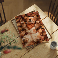 Belly Up, Leaf Pile Approved, print laid on a wooden table beside a white mug and flowers