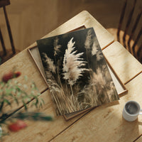 Gone With The Wind, Fluff Included, print laid on a wooden table beside a white mug and flowers
