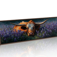 Texas Longhorn Resting in Bluebonnet Meadow