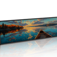 Canoe Drifting Across A Golden Lake