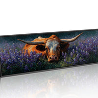 Texas Longhorn Resting in Bluebonnet Meadow